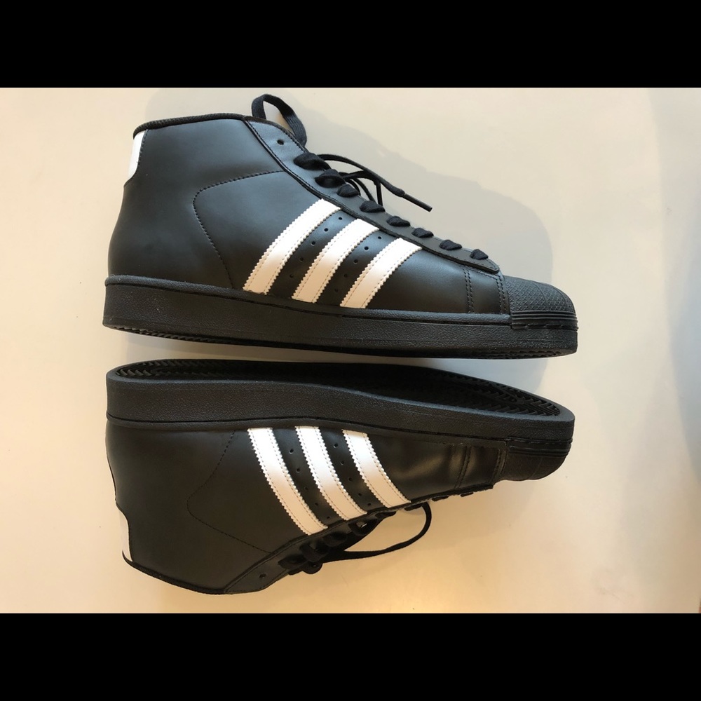 Brand new, never worn Adidas Pro Model Black